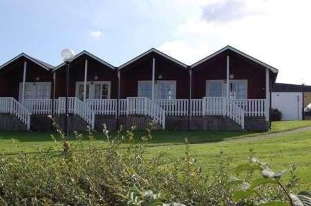 Allegarden Kastlosa Stugor
