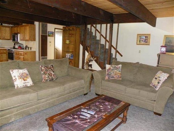 Happy Bear by Big Bear Cool Cabins