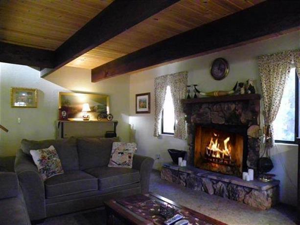 Happy Bear by Big Bear Cool Cabins