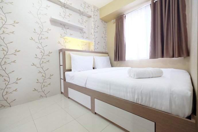 Extravaganza 2BR Bassura City Apartment By Travelio