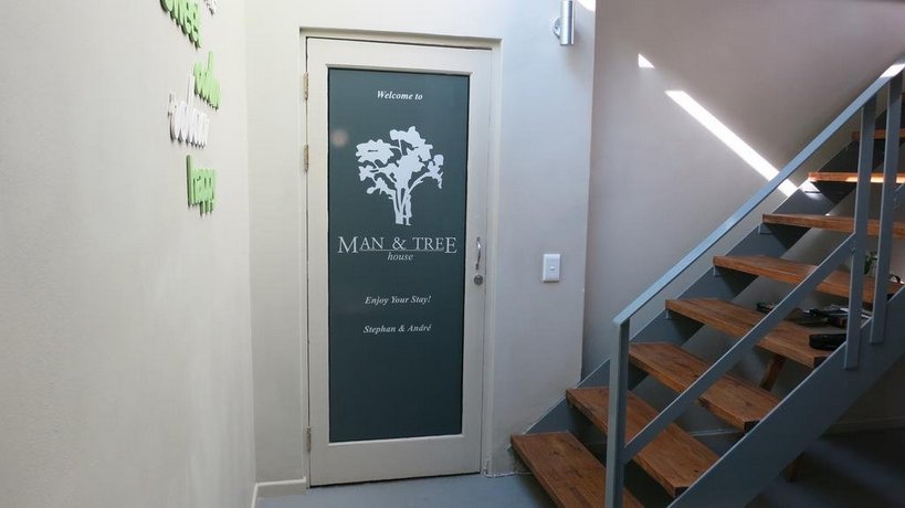 Man and Tree House