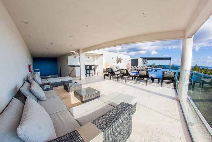 Magnificent 3BR condo close to the Caribbean sea by Happy Address