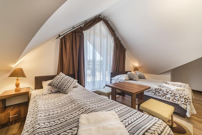 Pokoje i Apartamenty Poducha