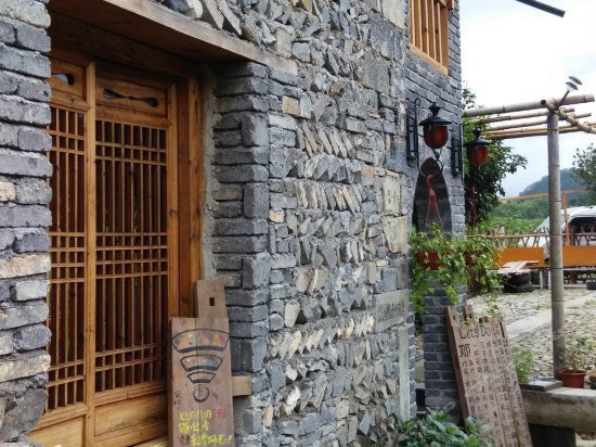 Xidi Kunlun International Hostel Hu Wenguang Provincial Governor Archway China thumbnail