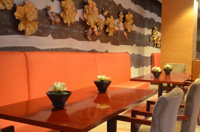 E Mei Shan Century Sunshine Shangsai Hotel