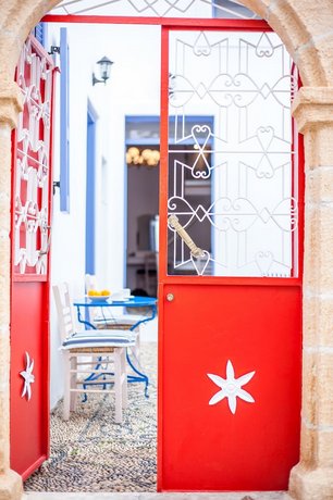 The red door in Koskinou