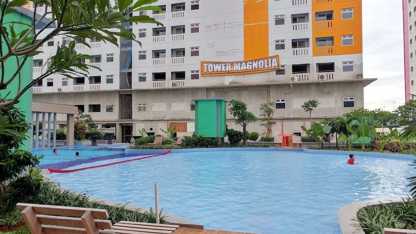 Studio Green Pramuka City Apartment with Mall Access By Travelio