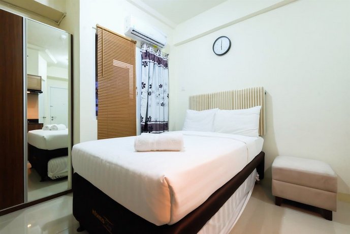Studio Green Pramuka City Apartment with Mall Access By Travelio