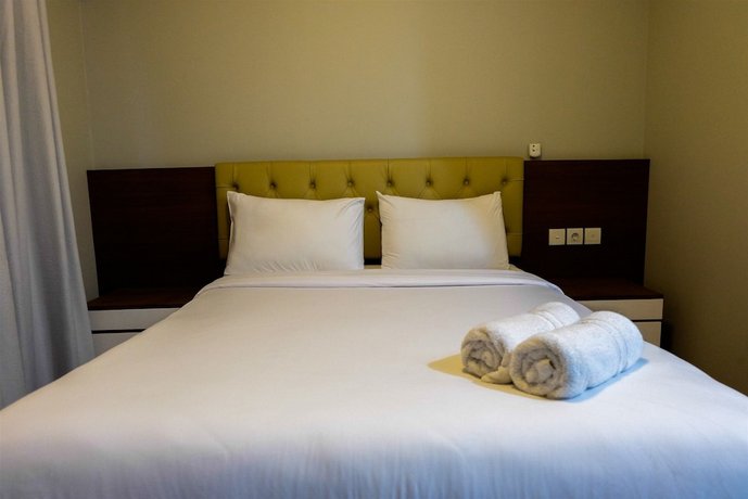 Amazing 2BR with City View The Wave Apartment By Travelio