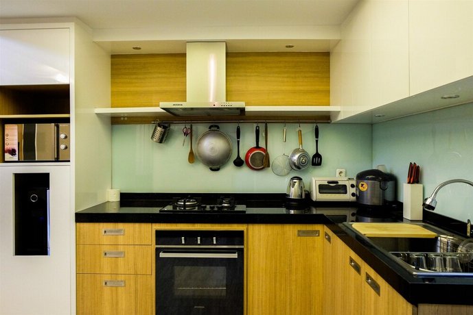 Amazing 2BR with City View The Wave Apartment By Travelio