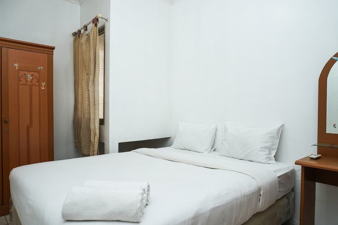 Affordable 1BR Mediterania Gajah Mada Apartment By Travelio