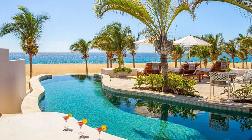 Spectacular 3-Story Beachfront Villa with a Huge Pool Patio