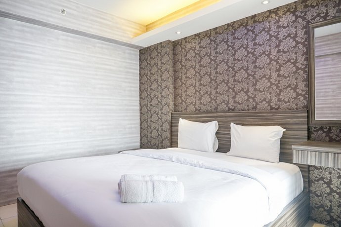 Comfortable 3BR Apartment at Green Palm Residences By Travelio