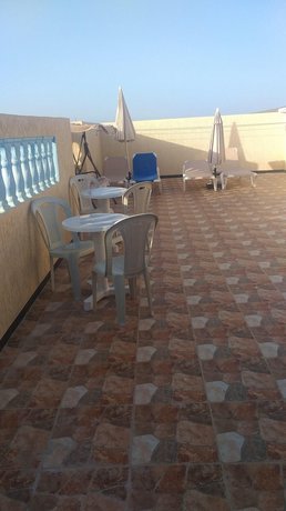 House with 2 bedrooms in Mirleft with wonderful city view and furnished terrace 500 m from the beach