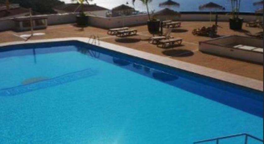 House with 3 bedrooms in Costa Adeje with wonderful sea view shared pool and furnished terrace