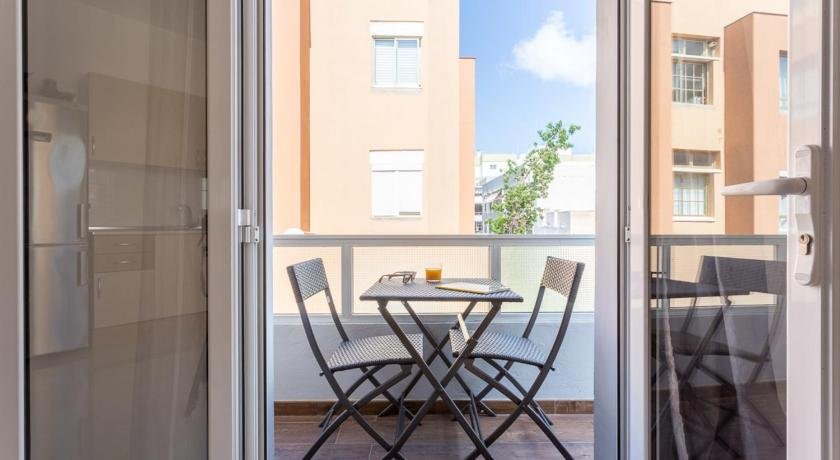Bright with terrace next to the beach