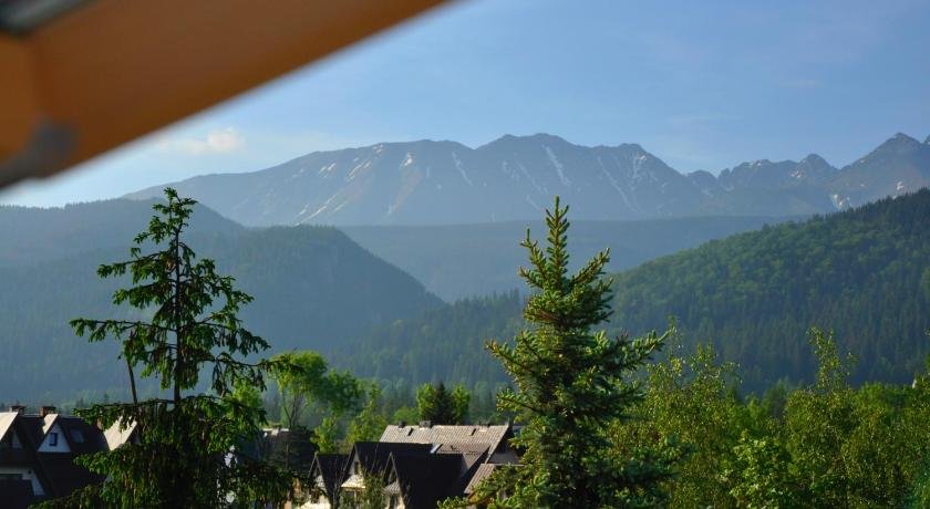 Apartament Wokol Stolu