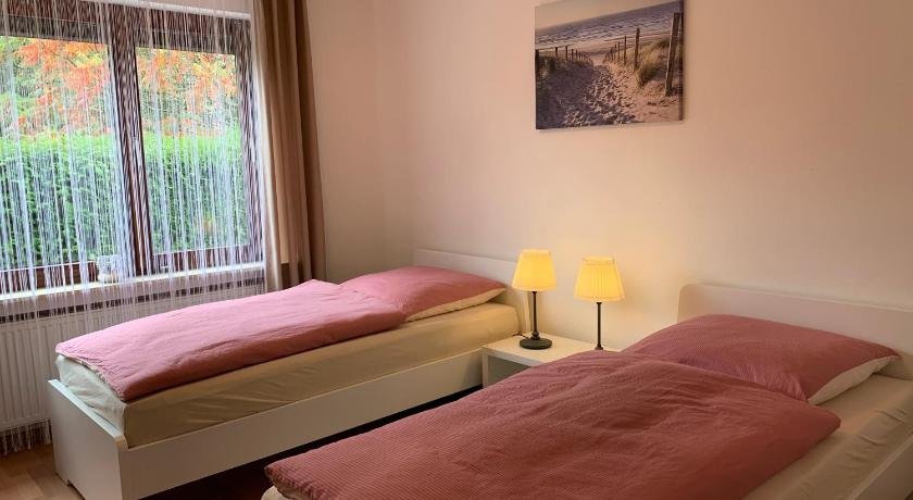 Moderne Ferienwohnung Brazil im EG mit eingezauntem Garten und Terrasse in Sudwestlage