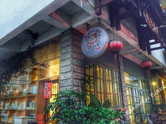Xiyu Hostel Cat Cafe The Assembled Dragon Cave China thumbnail