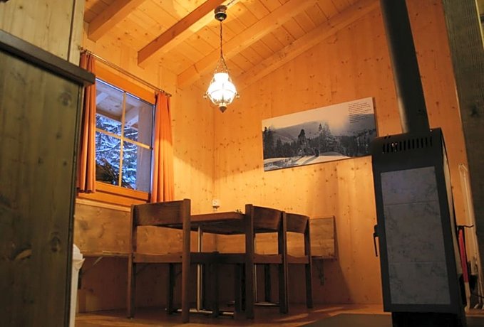 Huttenhotel Husky Lodge Holloch Cave Switzerland thumbnail