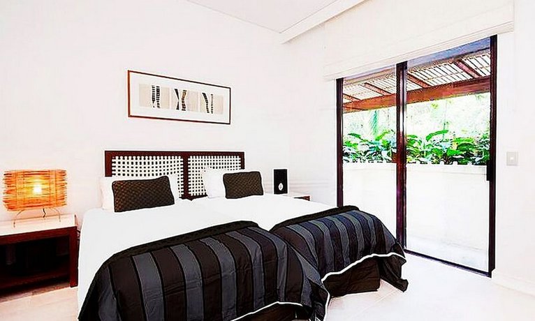 Photo: Temple 121 Modern Spacious Palm Cove 2 Brm 2 Bth Resort Apartment With Courtyard