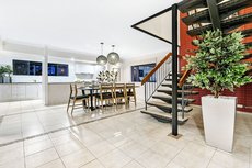 Gold Coast accommodation: 7 Bedroom Gold Coast Luxury Waterfront Home with Pool sleeps 20