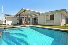Mooloolaba accommodation: Palm 95 - Modern 4 BDRM Home with Pool