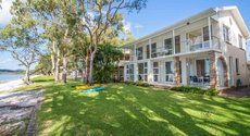 Salamander Bay accommodation: The Foreshore Superb Waterfront house