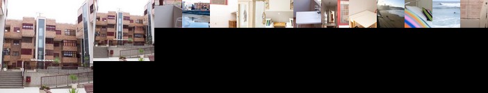 Junto a la Playa y el Auditorio