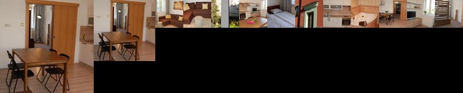 Apartment in a red house parking in front the house