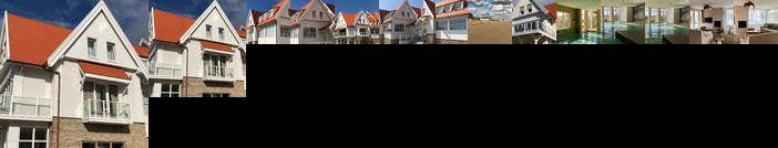 Familie beachhuis op de duinen Duinhuis