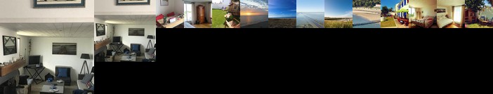 Une grande maison blanche sous le ciel bleu de Noirmoutier