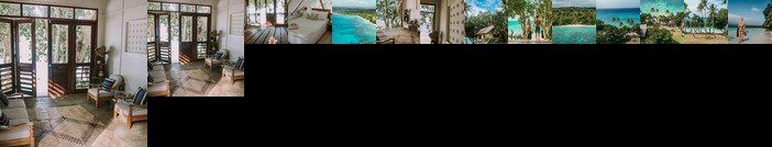 Whispering Palms -Two absolute Beachfront